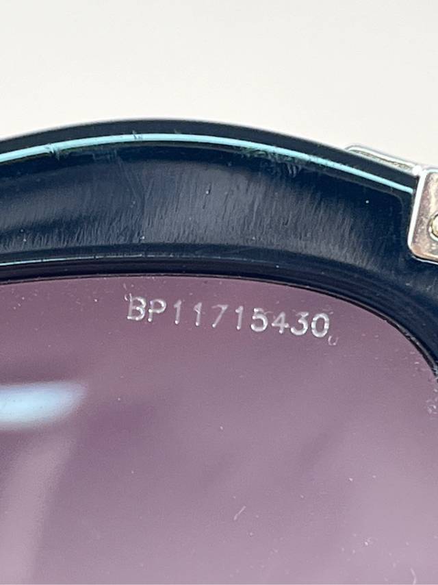 Miu Miu Black Cat-Eye Sunglasses with Gold Arms