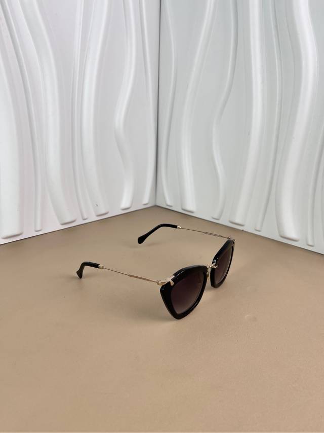 Miu Miu Black Cat-Eye Sunglasses with Gold Arms
