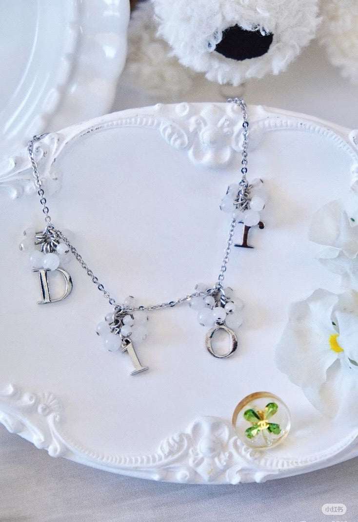 Dior Vintage Silver “D-I-O-R” Charm Bracelet with White Beaded Flowers