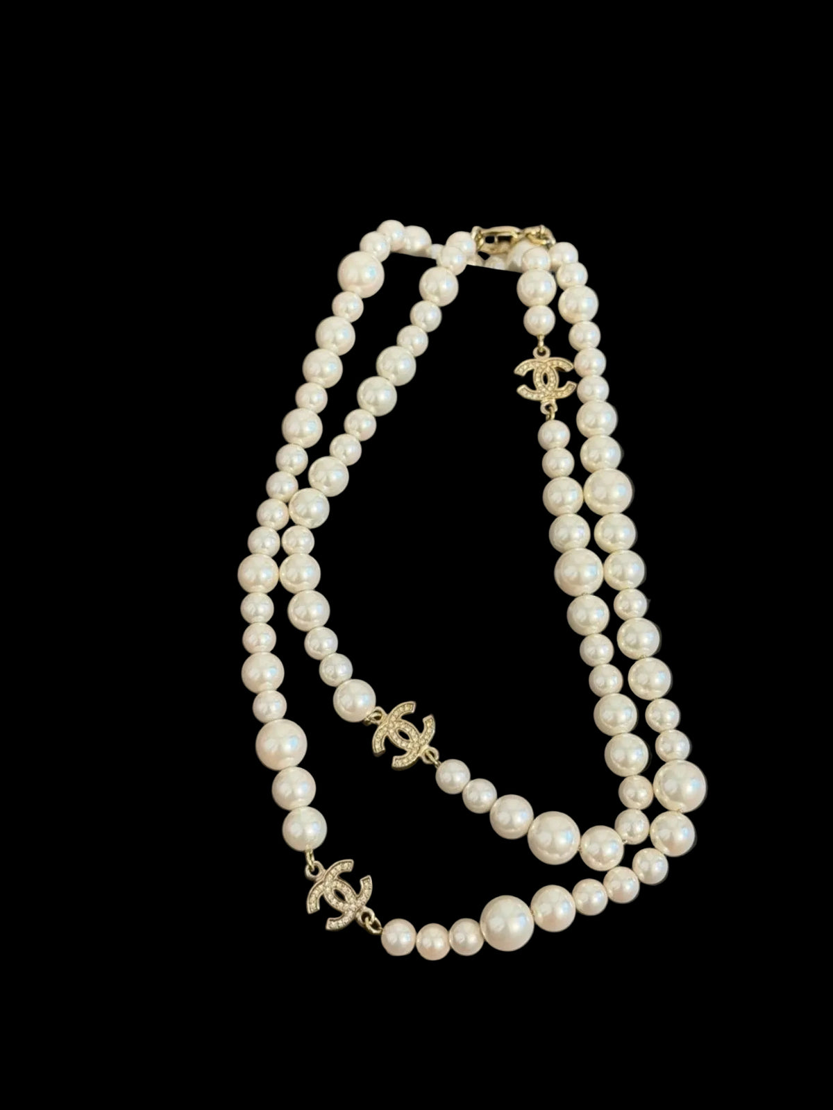 CHANEL Classic Faux Pearl
Crystal CC Long Necklace