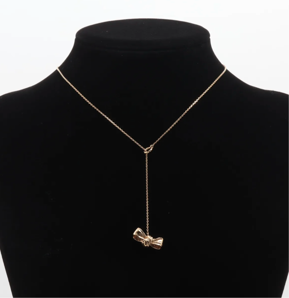 Dior Gold Bow Pendant Necklace with Pink Logo Charm