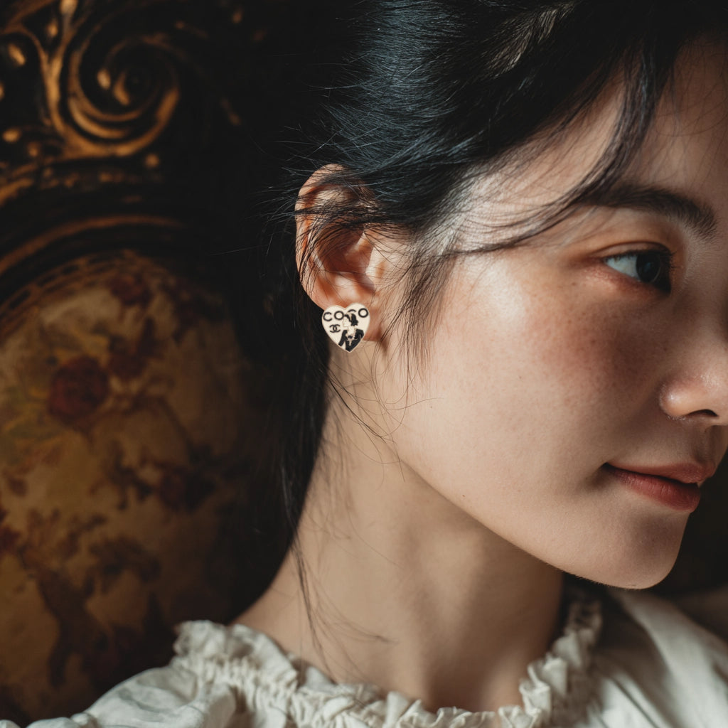 Chanel 2006 Heart-Shaped "Coco" Cameo Ear Clips