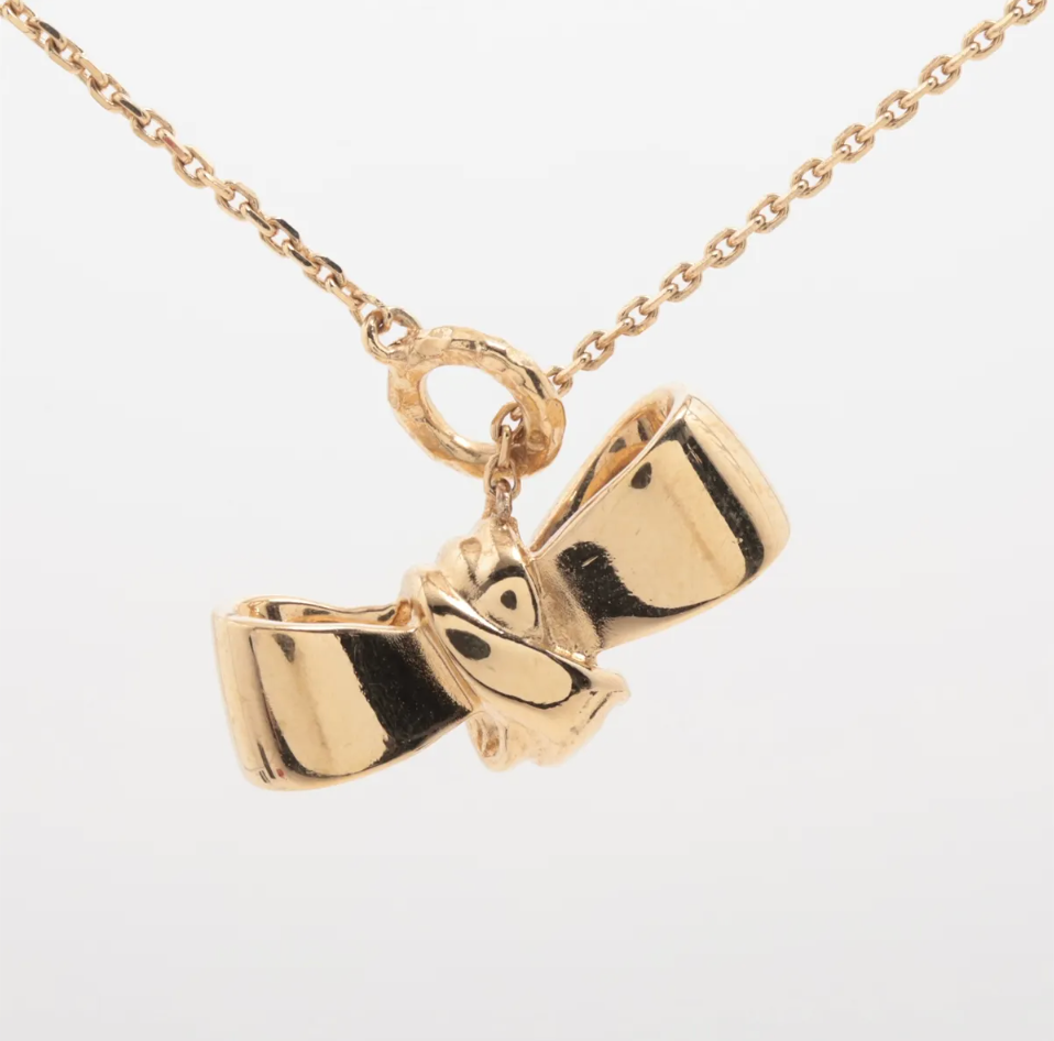 Dior Gold Bow Pendant Necklace with Pink Logo Charm