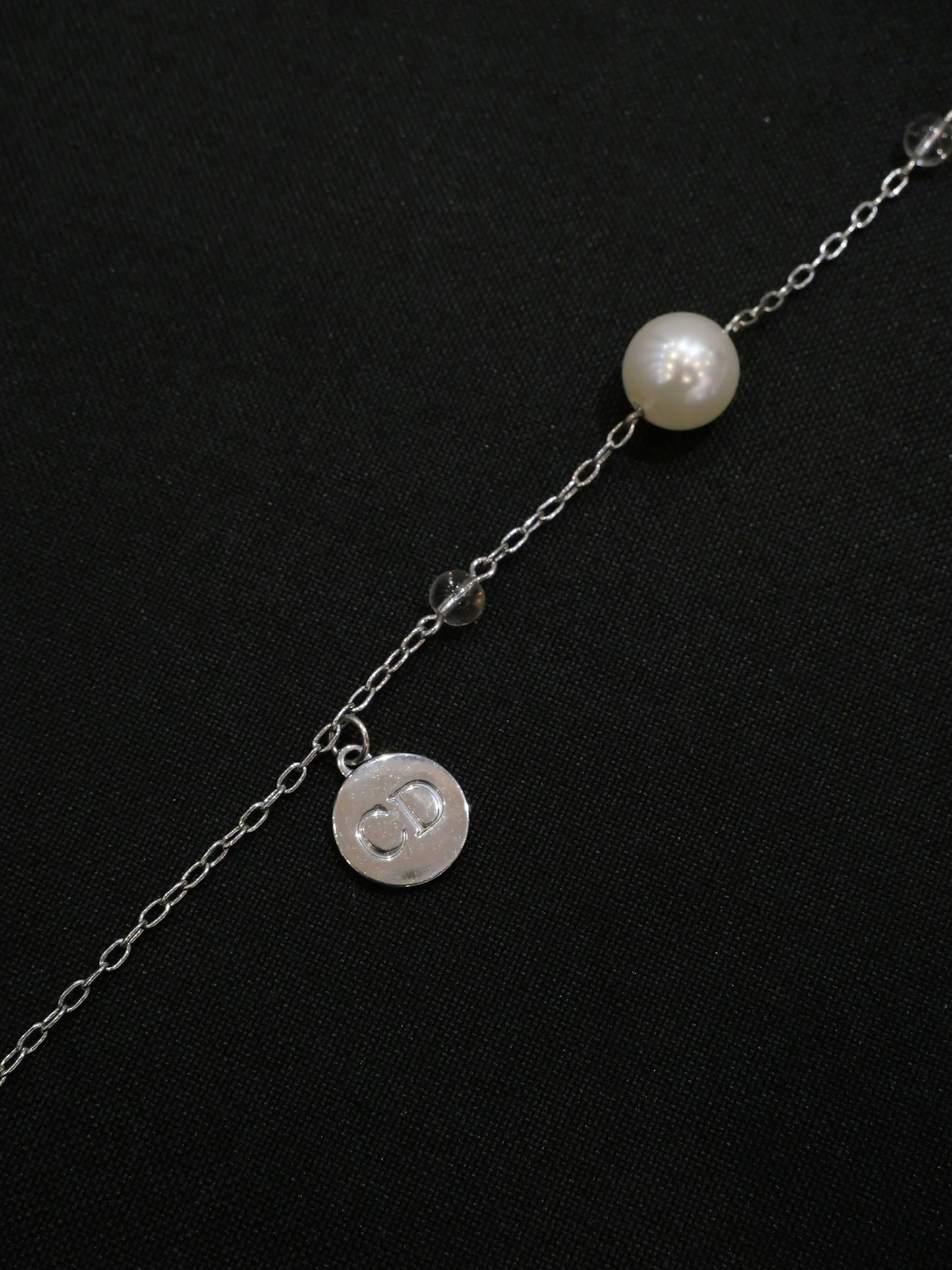 Dior Vintage Silver-Tone Charm Necklace with Bow and Crystal Pendant