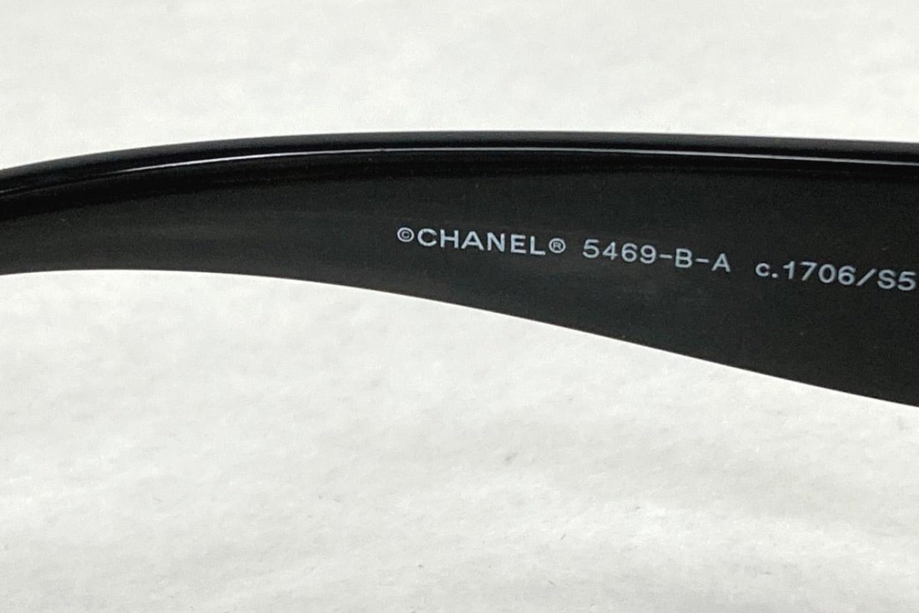 Vintage Chanel Black Round Sunglasses with Crystal CC Logo
