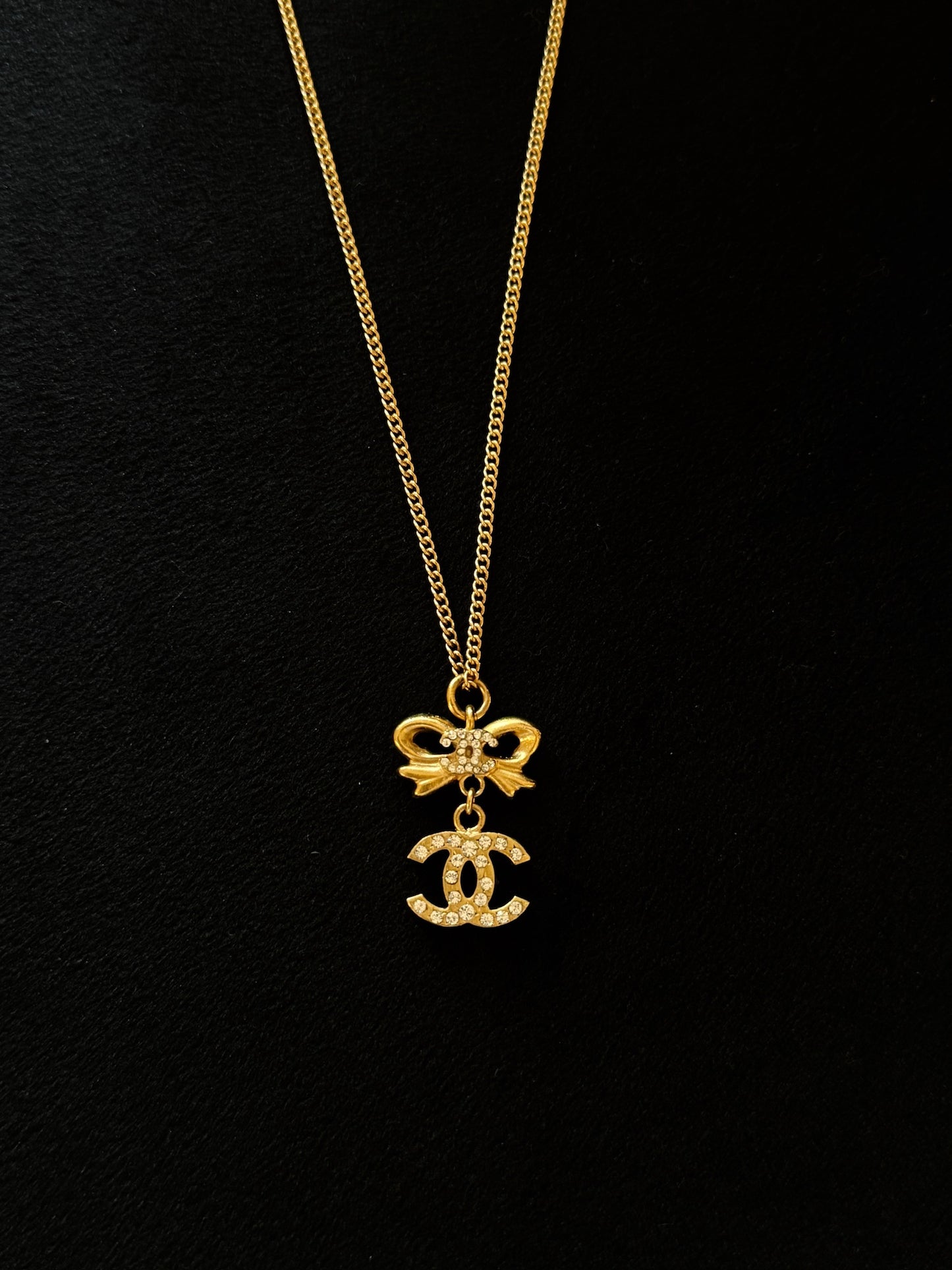 Chanel 2006 Plated Gold Crystal CC Bow Pendant Necklace
