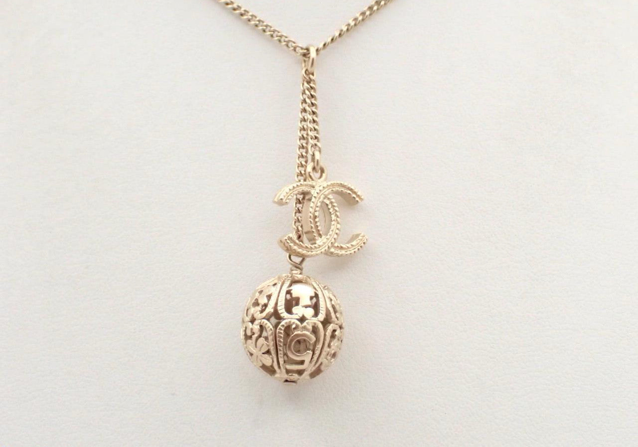 Chanel 2006 Champagne-Gold Filigree Sphere & CC Charm Necklace
