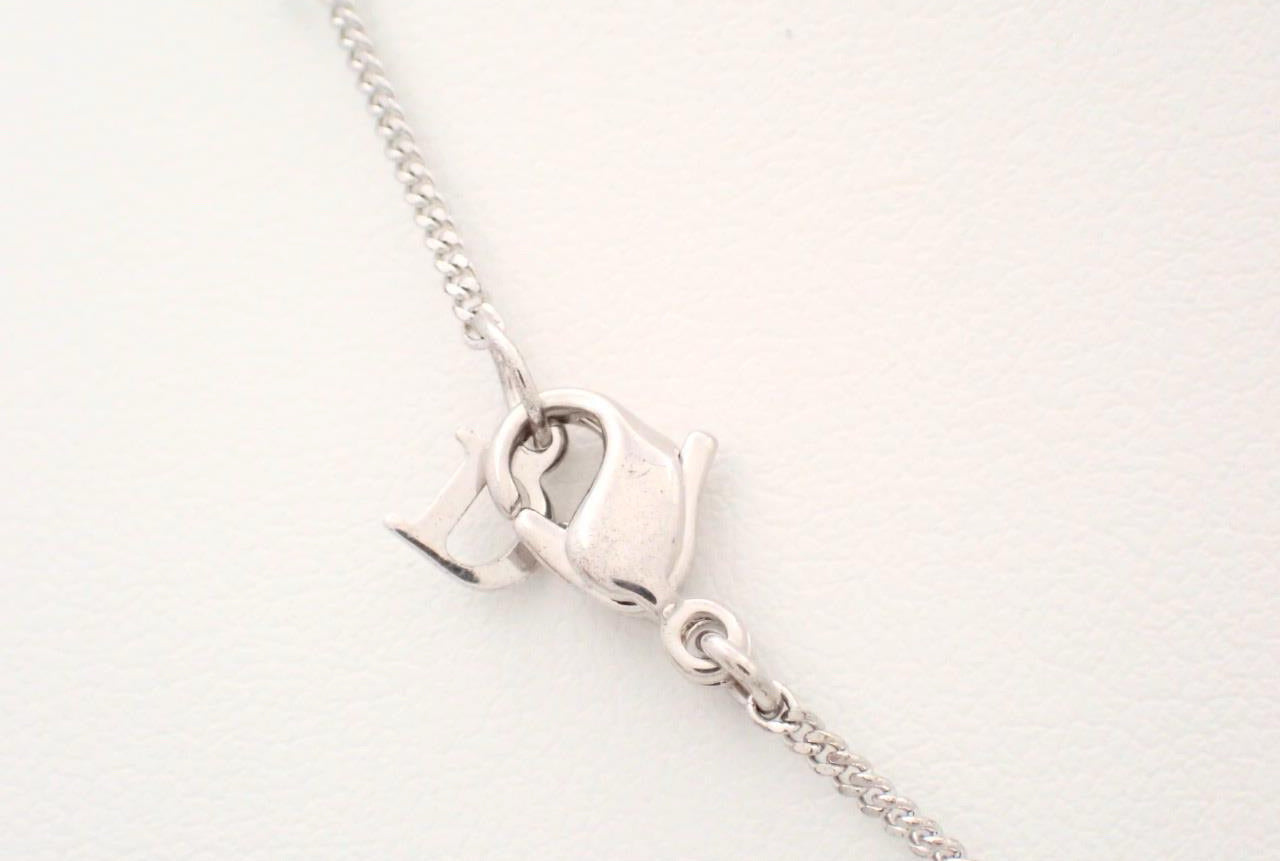 Vintage Dior Silver Logo Pendant Necklace with Pink Crystal Accent