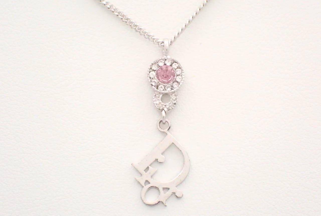 Vintage Dior Silver Logo Pendant Necklace with Pink Crystal Accent