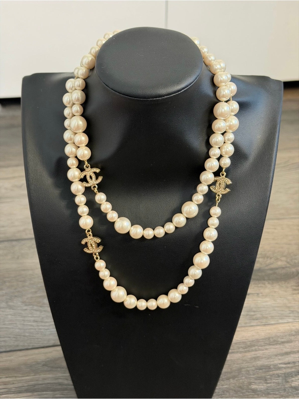 CHANEL Classic Faux Pearl
Crystal CC Long Necklace