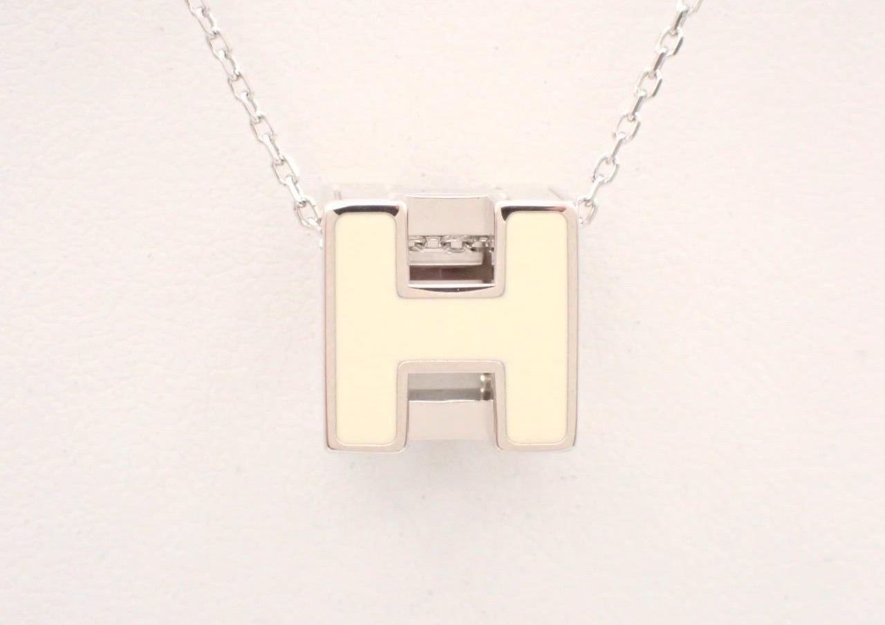 Hermès H Cube Pendant Necklace – White & Silver Tone