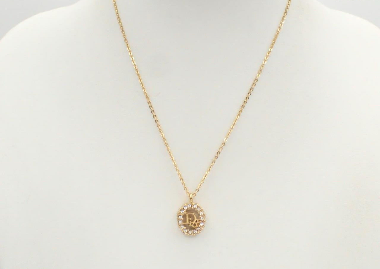 Vintage Dior Gold-Tone Vertical Crystal Logo Pendant Necklace
