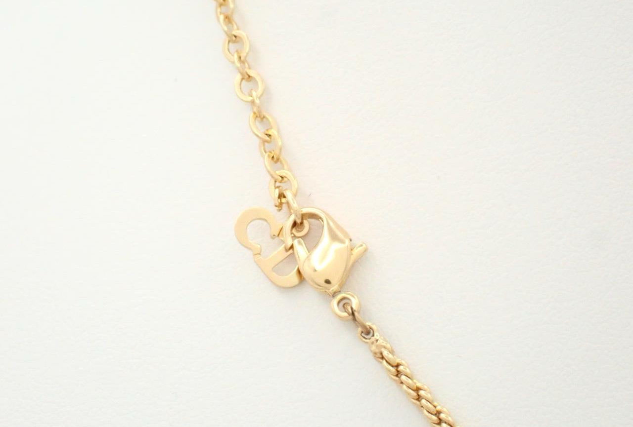 Dior 1980s Bow Heart Pendant Necklace (Gold Tone)
