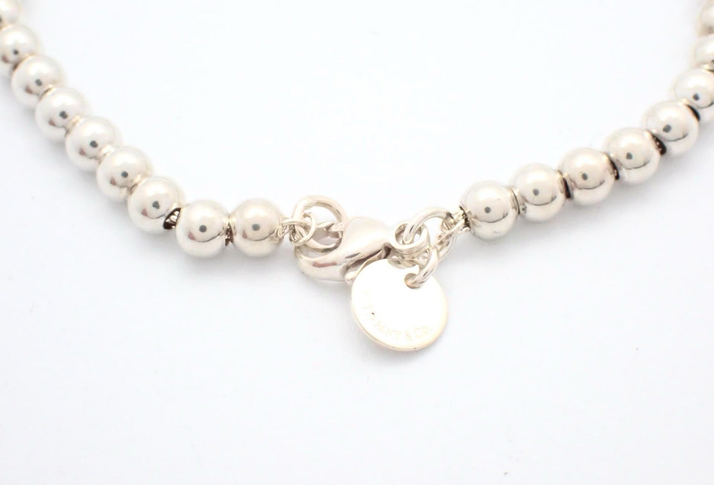 Tiffany & Co. Sterling Silver Bead Bracelet with Turquoise Heart Charm