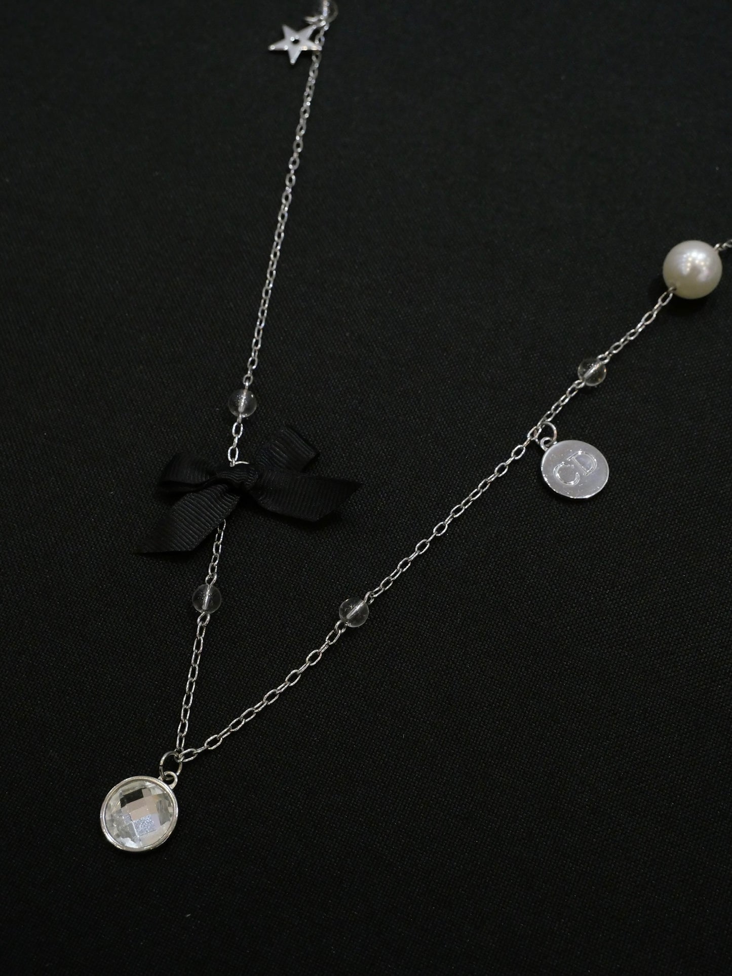 Dior Vintage Silver-Tone Charm Necklace with Bow and Crystal Pendant