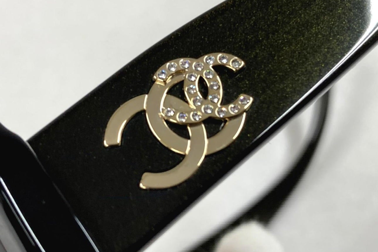 Vintage Chanel Black Round Sunglasses with Crystal CC Logo