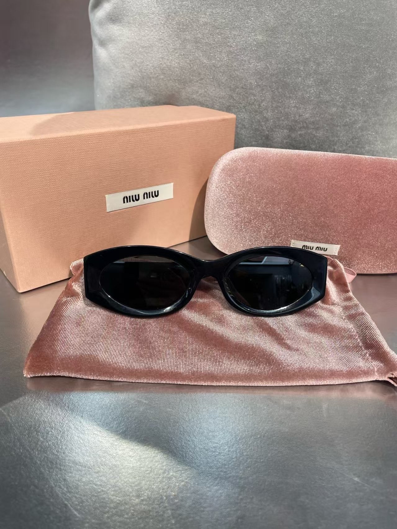 Miumiu Glimpse Sunglasses