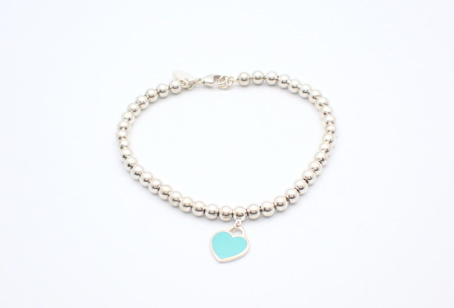 Tiffany & Co. Sterling Silver Bead Bracelet with Turquoise Heart Charm