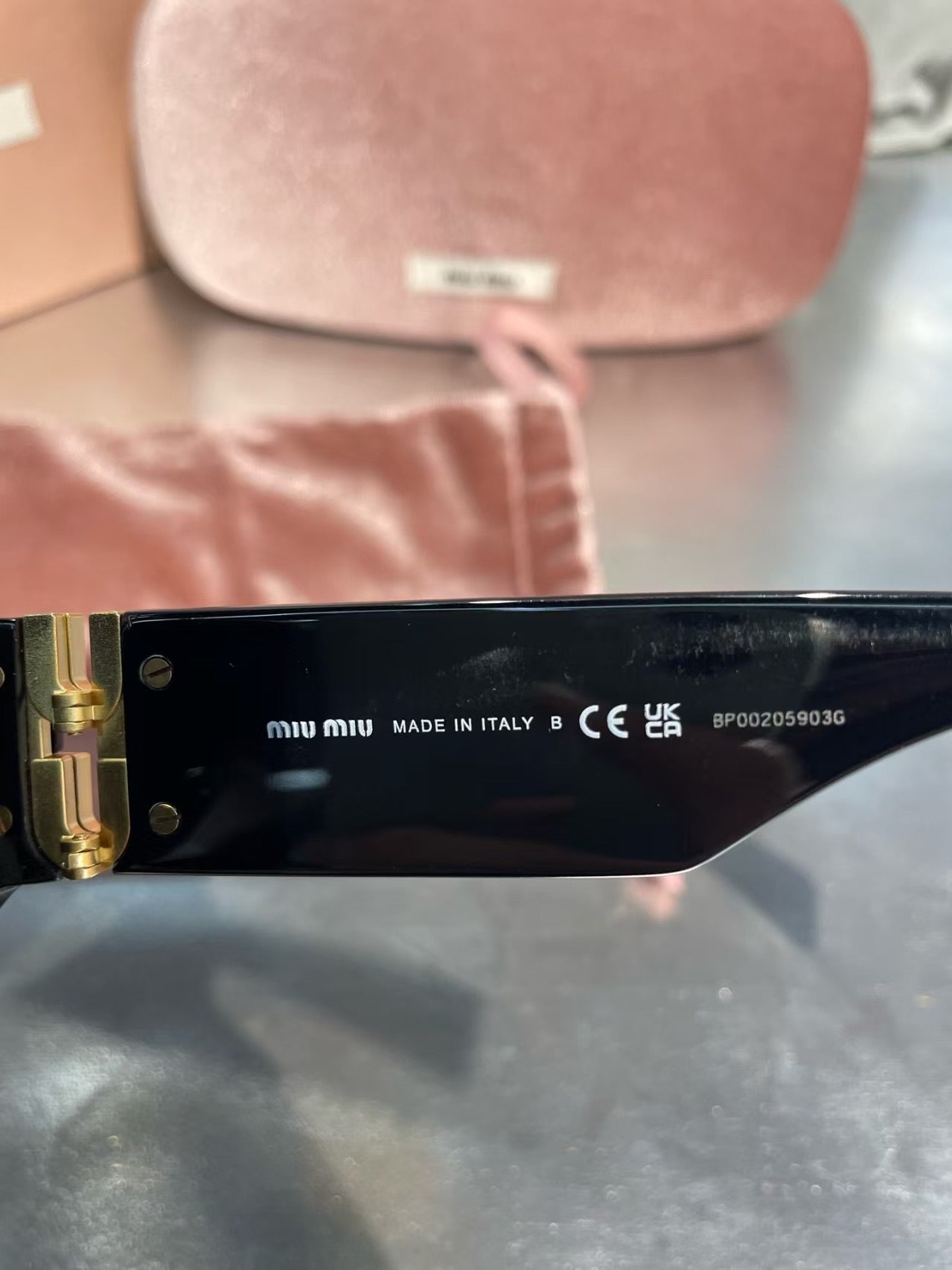 Miumiu Glimpse Sunglasses