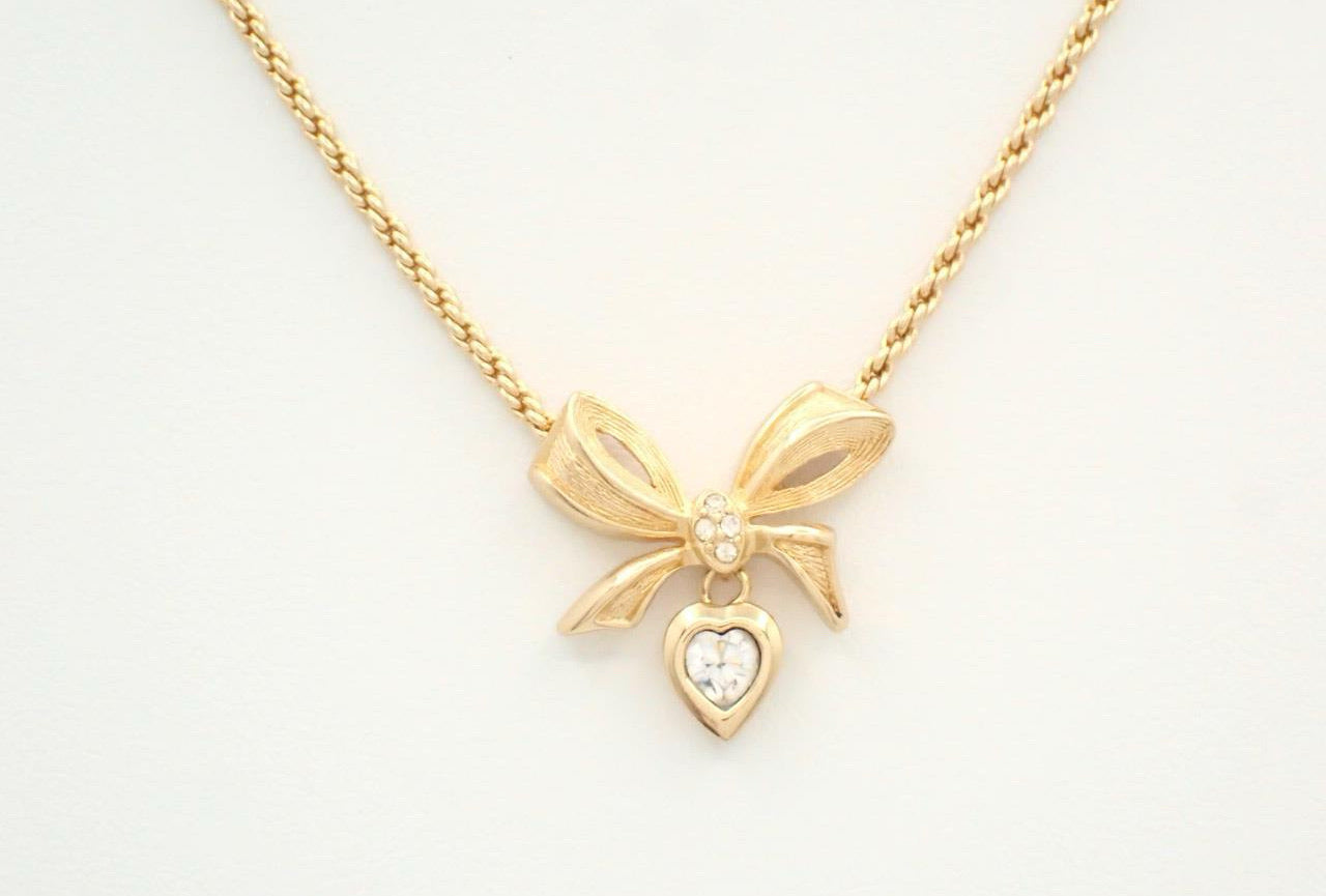 Dior 1980s Bow Heart Pendant Necklace (Gold Tone)