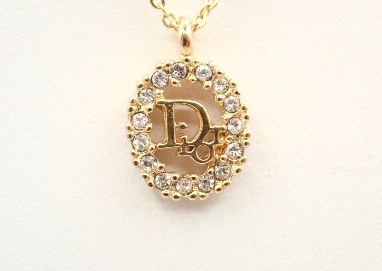Vintage Dior Gold-Tone Vertical Crystal Logo Pendant Necklace