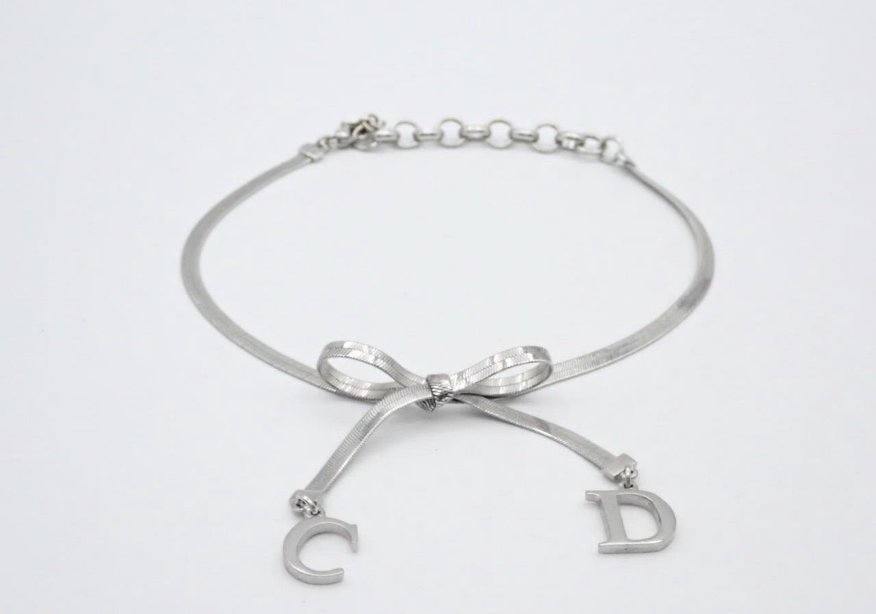 Dior Bow Charm Necklace – Silver Tone