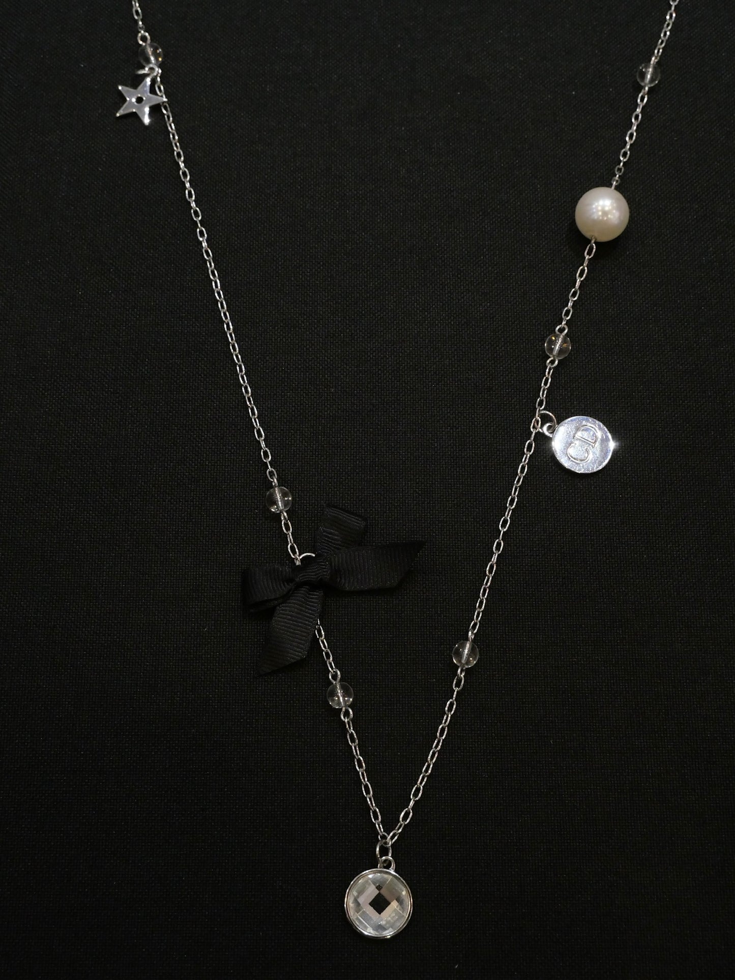 Dior Vintage Silver-Tone Charm Necklace with Bow and Crystal Pendant