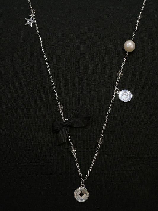 Dior Vintage Silver-Tone Charm Necklace with Bow and Crystal Pendant