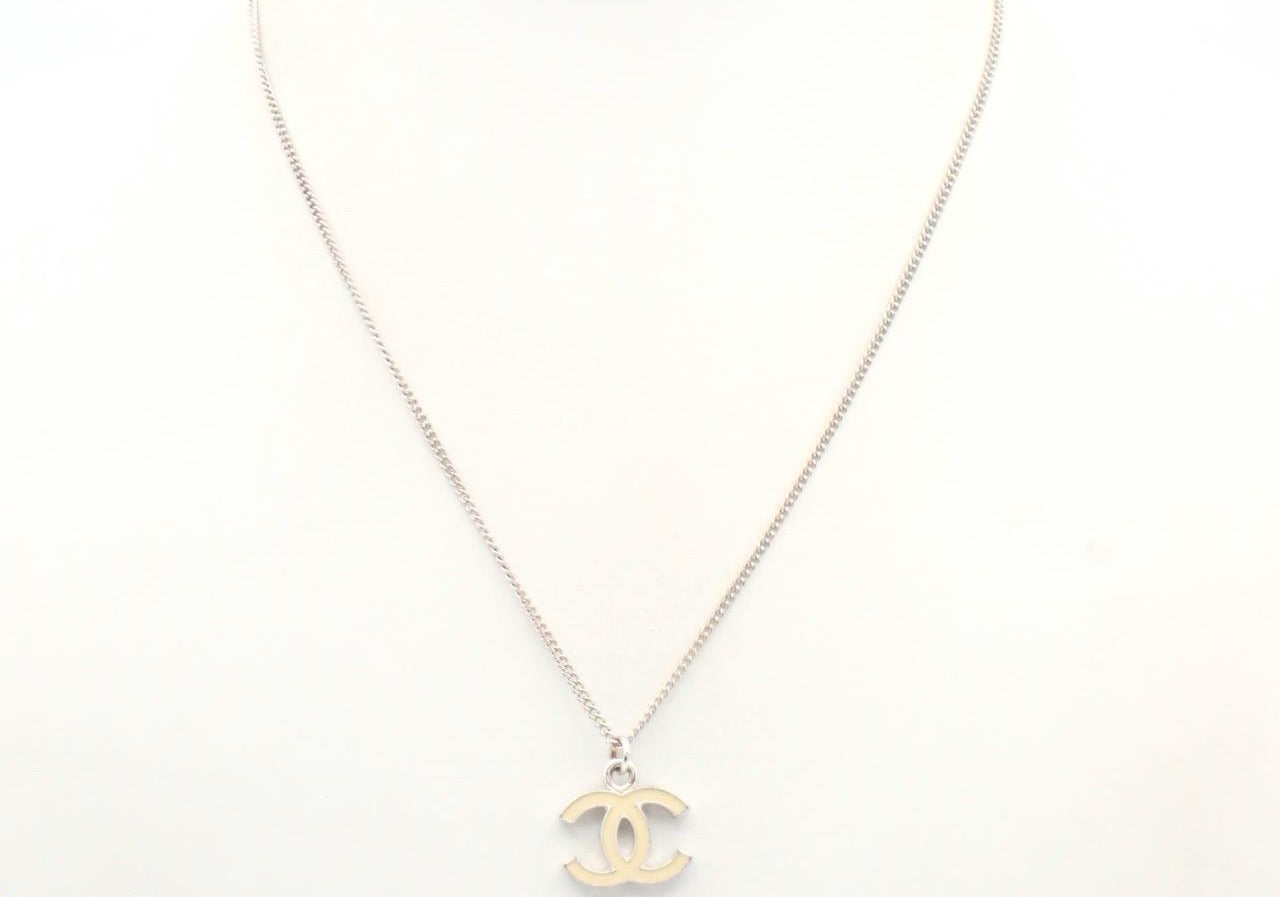 Chanel 2005 Ivory Enamel Double-C Pendant Necklace in Silver-Tone
