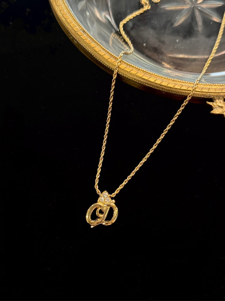 Dior Vintage Gold-Tone Script Logo Necklace with Crystal Accent
