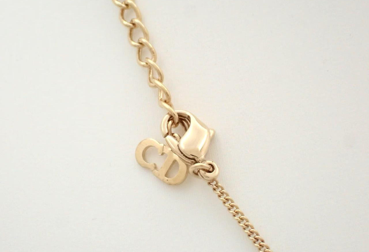 Dior Gold-Tone Crystal Dolphin Pendant Necklace