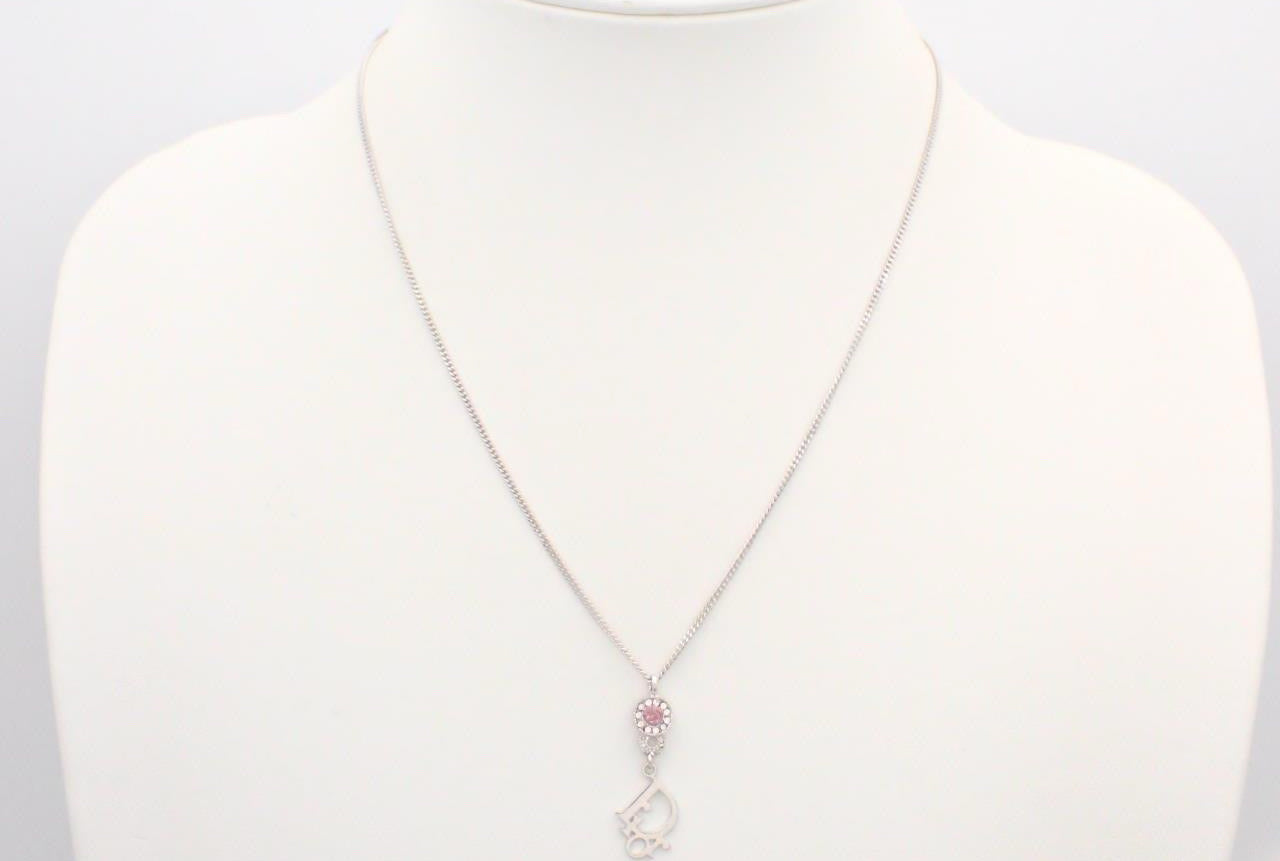 Vintage Dior Silver Logo Pendant Necklace with Pink Crystal Accent