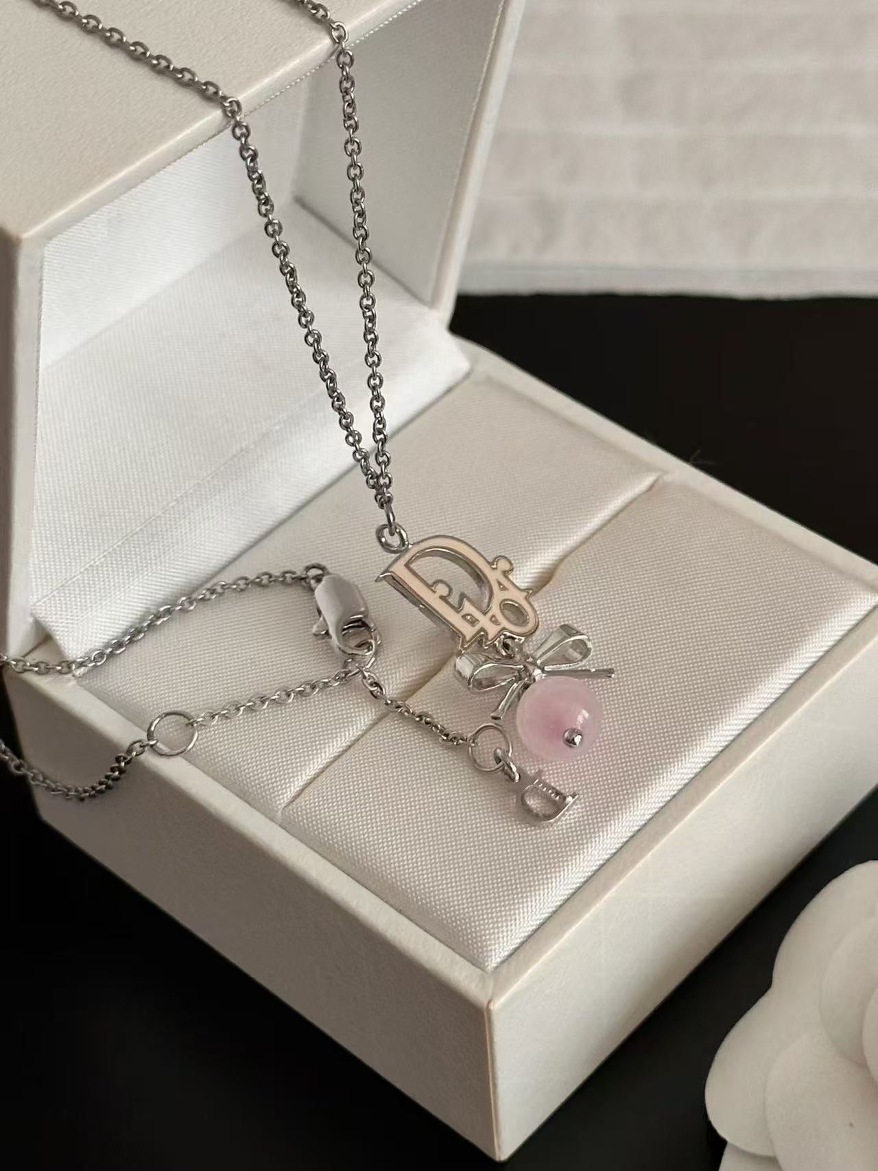 Dior Silver-Tone Logo Bow Pendant Necklace
