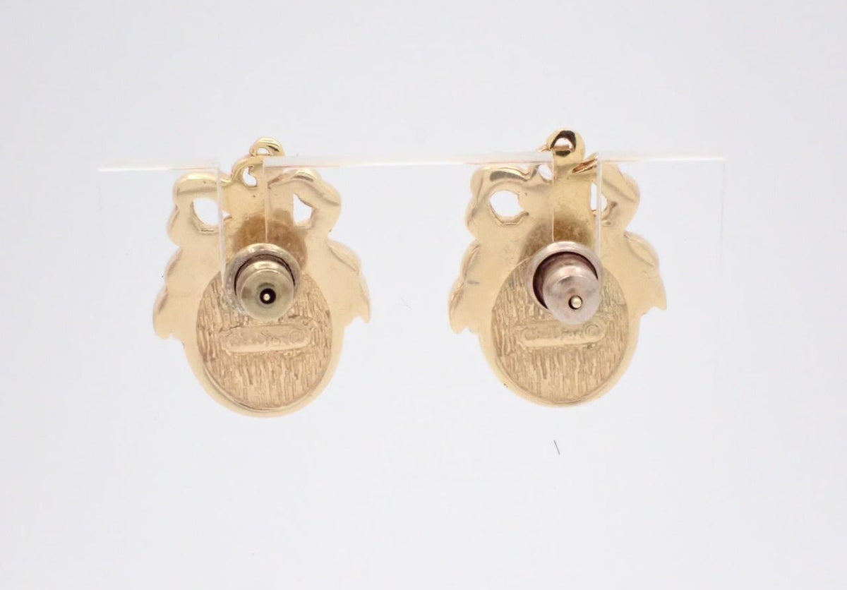 Dior gold-tone stud earrings with faux pearl cabochon and bow motif