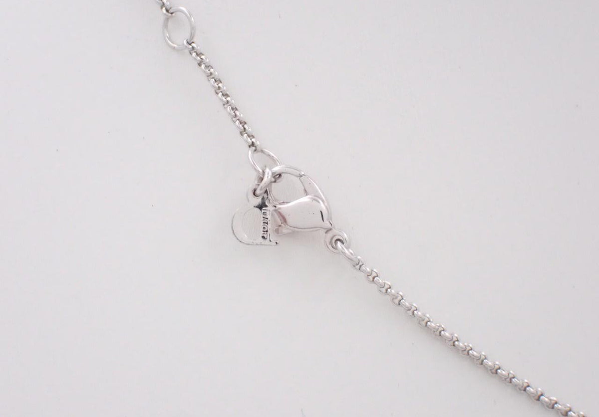 Dior silver necklace with rhinestone logo and pink teardrop stone