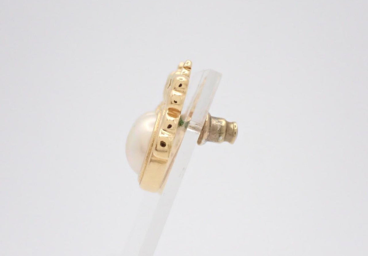 Dior gold-tone stud earrings with faux pearl cabochon and bow motif
