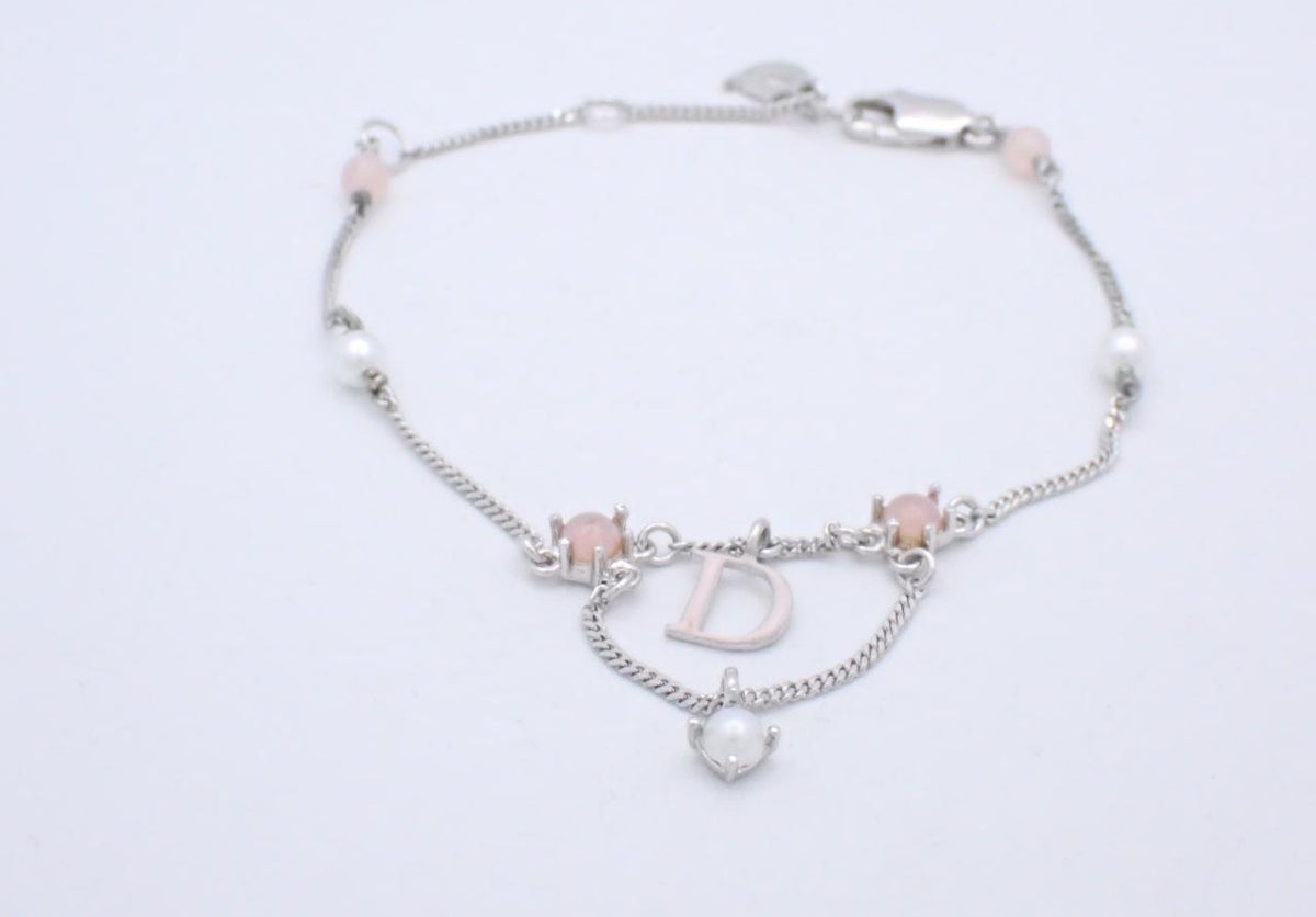 Dior silver bracelet with pink beads and pearl drop
