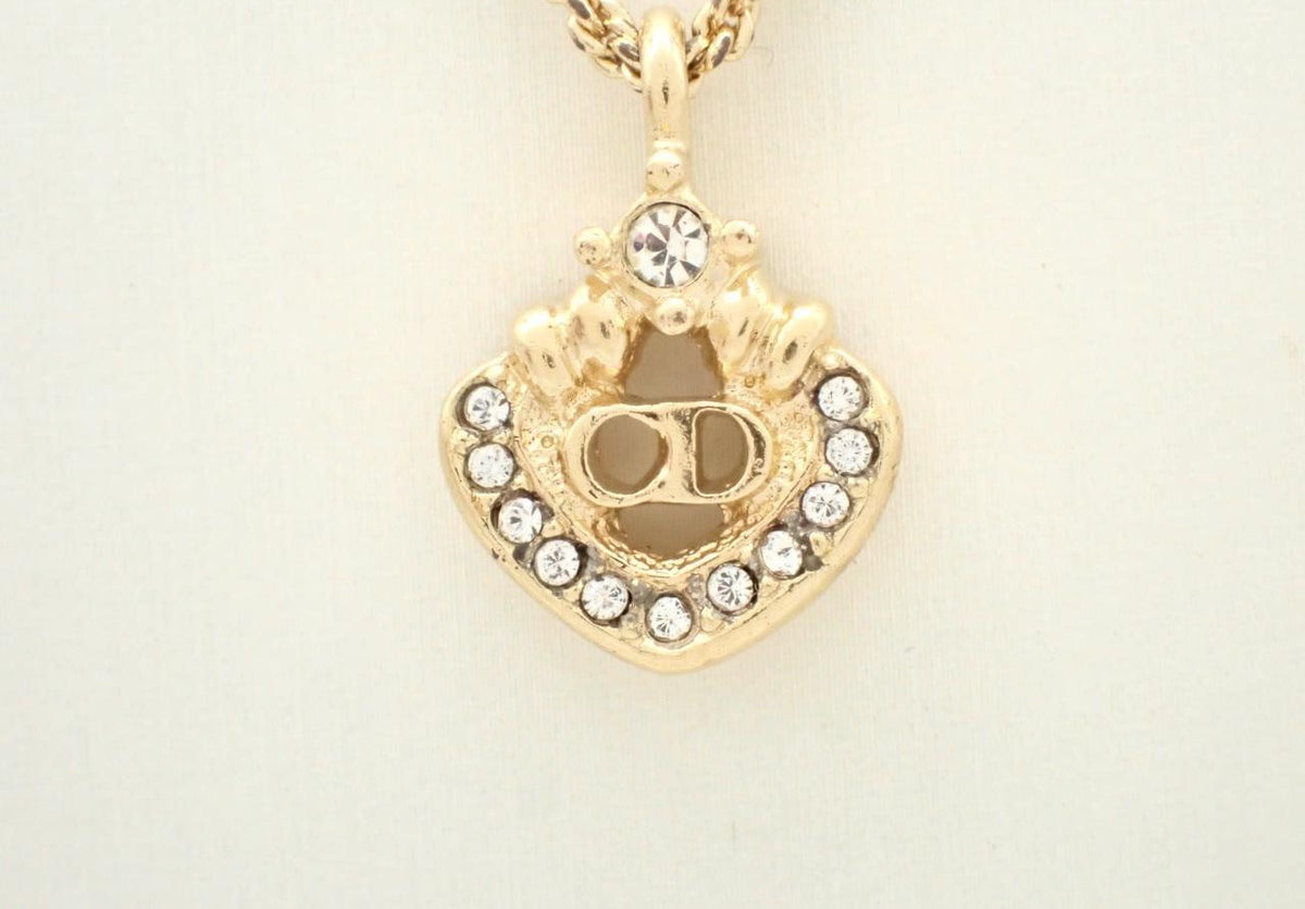 Dior gold necklace with rhinestone heart and CD monogram pendant