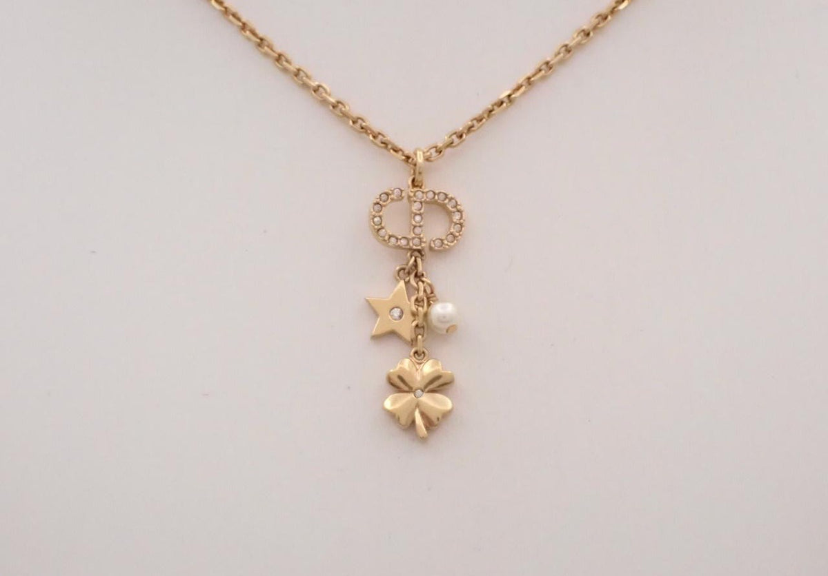 Dior gold-tone chain necklace with crystal CD logo, clover and star charms