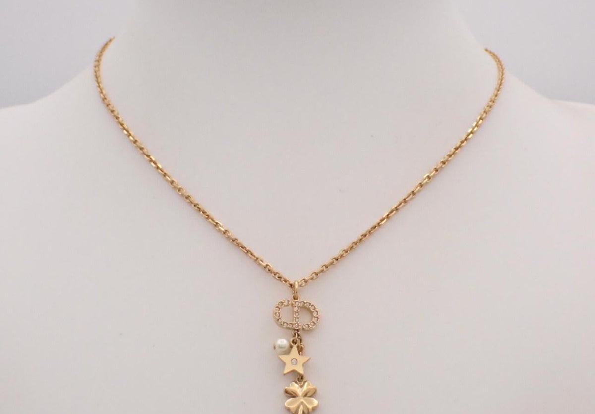 Dior gold-tone chain necklace with crystal CD logo, clover and star charms