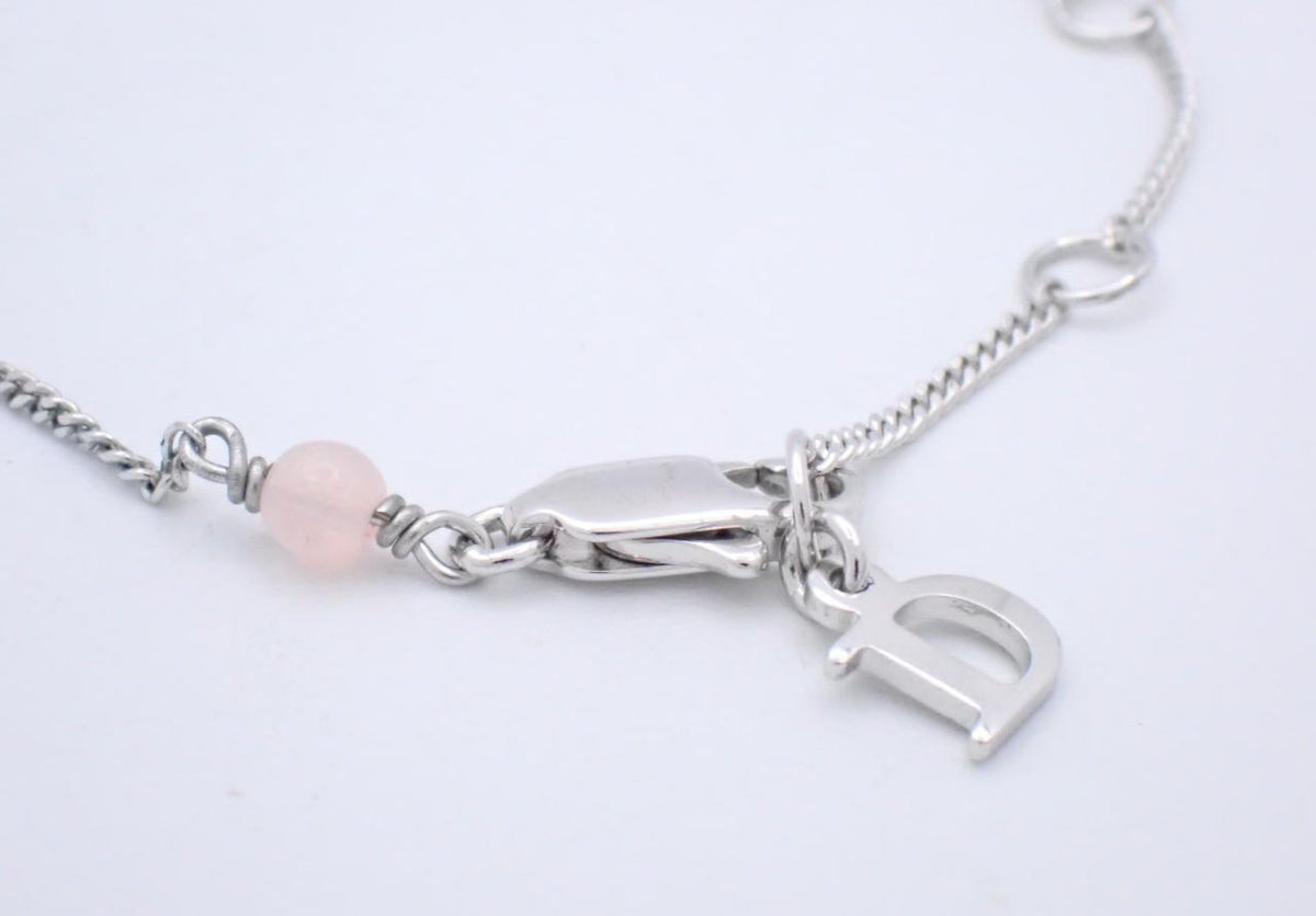Dior silver bracelet with pink beads and pearl drop