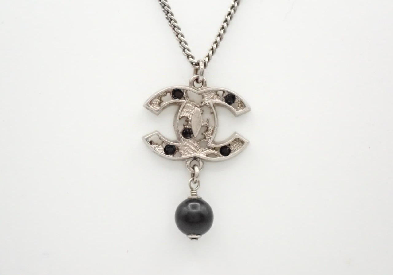 Chanel Vintage “Noir CC Pearl Drop” Silver-Tone Pendant Necklace