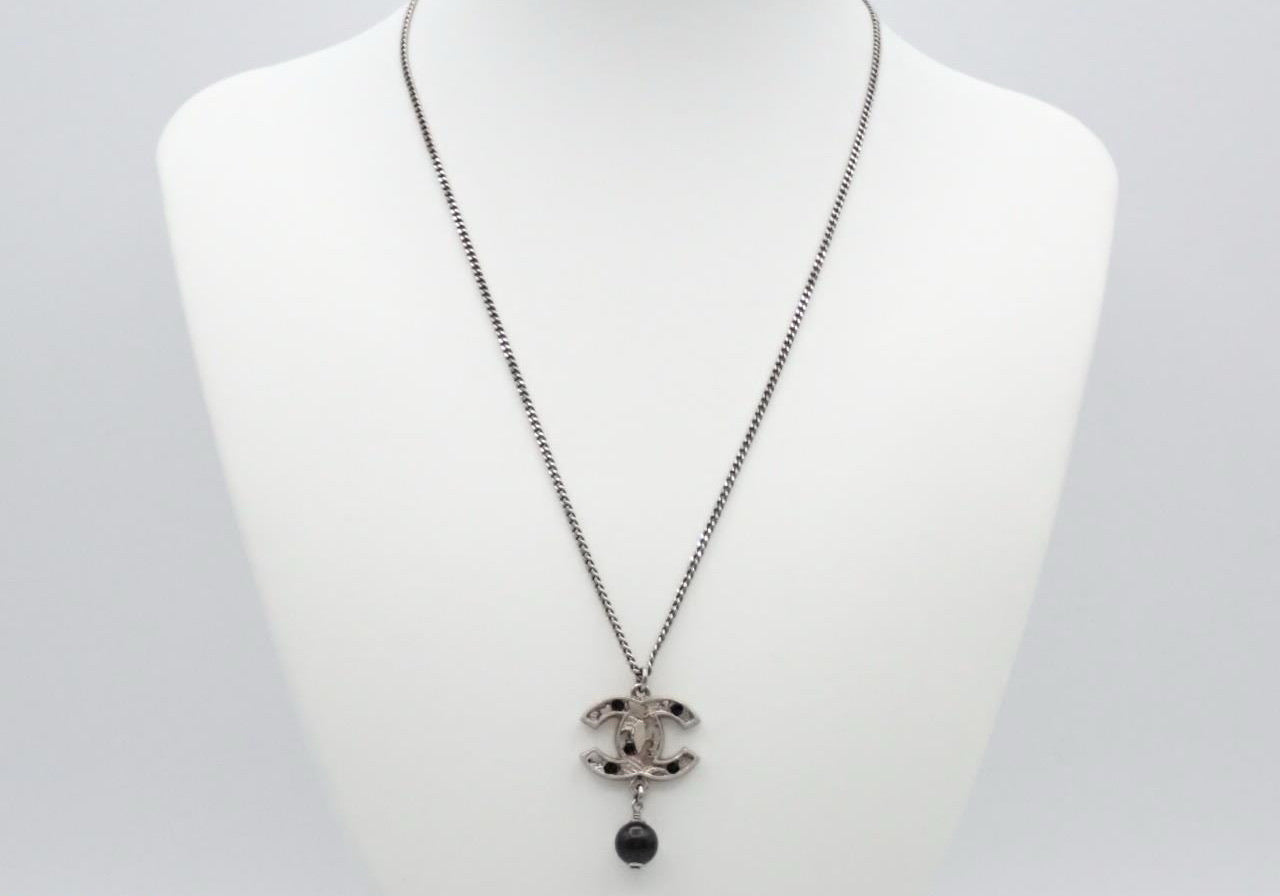 Chanel Vintage “Noir CC Pearl Drop” Silver-Tone Pendant Necklace