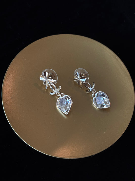 CHANEL 2022 Heart Crystal Drop Earrings – Silver-Tone with Bow Detail