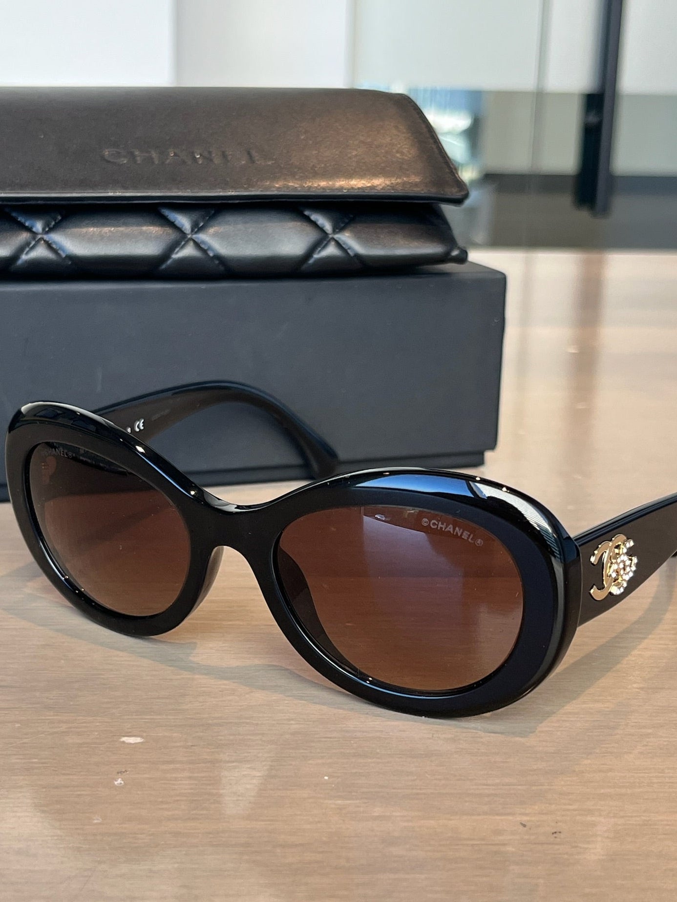 Vintage Chanel Black Round Sunglasses with Crystal CC Logo