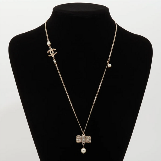 Chanel 2013 Pearl Bow & CC Charm Necklace